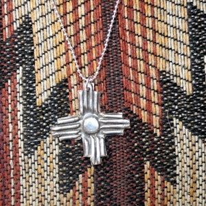 Zia symbol silver pendant