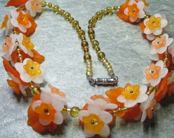 Necklace Of Orange And White Lucite Flowers