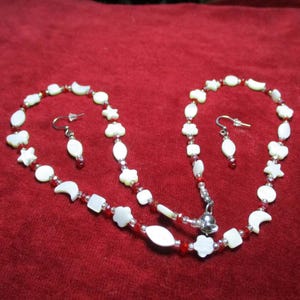 Necklaces Of Mother of Pearl Assorted Shape Beads And Various Coloured Czech Crystal Beads