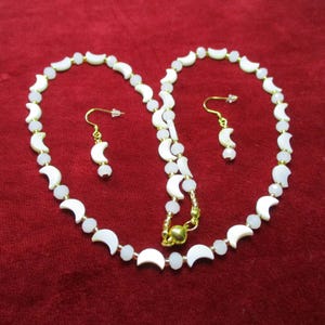 Necklaces Of Shaped Mother of Pearl Beads And Opaque White Czech Crystal