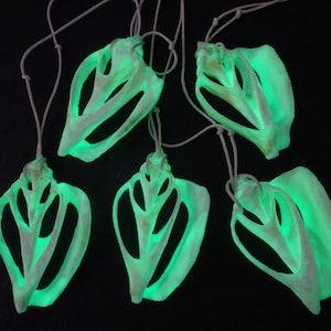 Glow-in-the-dark LARP jewelry snail shell discs white green