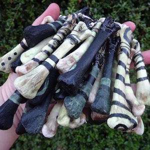 Glow-in-the-dark shaman bone jewelry for LARP white green black