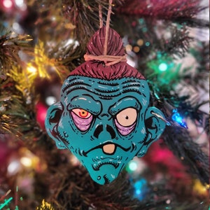 Original Hand Painted Shrunken Head Ornament Car Dangle 4 in L x 3 in W MDF Board 1/4 in thick Hung on Twine in Teal, Green, Purple, or Blue