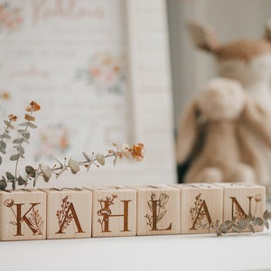 Floral themed personalized wooden baby name alphabet blocks with plant and floral graphics made of solid hardwood wooden baby toy gift custom name option gift box included gift message