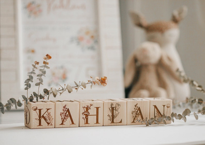 Floral themed personalized wooden baby name alphabet blocks with plant and floral graphics made of solid hardwood wooden baby toy gift custom name option gift box included gift message