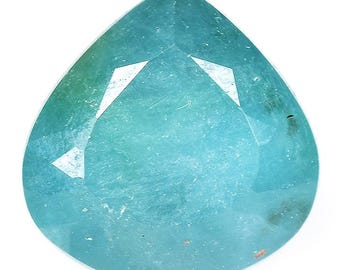 May include: A teardrop-shaped, faceted gemstone with a light blue to green color. The gemstone has a smooth, polished surface.