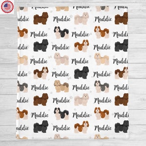 May include: A white background with a repeating pattern of brown, black, and cream colored dogs. The dogs are all facing forward and have the name "Maddie" written below them.