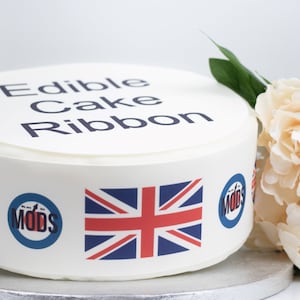 May include: Edible cake ribbon featuring a Union Jack flag, a logo that says "Mods" and the text "Edible Cake Ribbon".