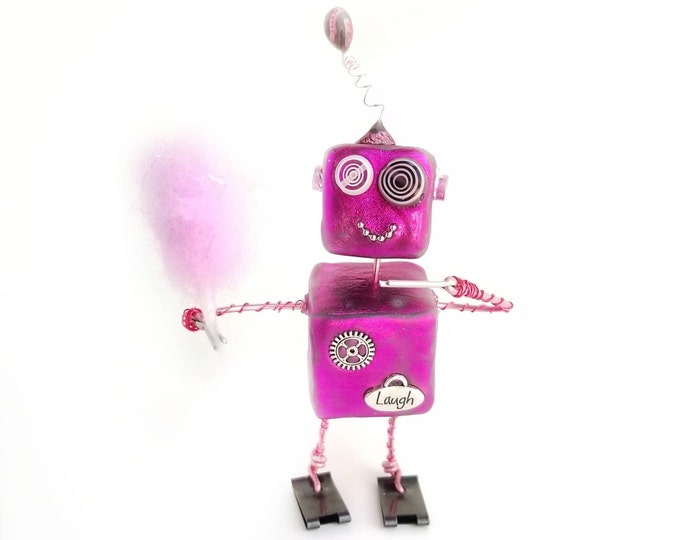 Pink robot sculpture, cotton candy art, retro robot figurine with cotton candy