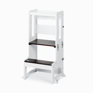 May include: White wooden step stool with two steps and a safety rail. The top step has a brown wooden surface. The stool has a safety latch on the side.