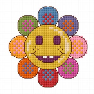 Puede incluir: Un diseño de punto de cruz de una flor sonriente con un centro amarillo, ojos morados y una amplia sonrisa. Los pétalos de la flor son de varios colores, incluyendo rosa, naranja, verde y azul, cada uno con un diseño estampado. El fondo es blanco.