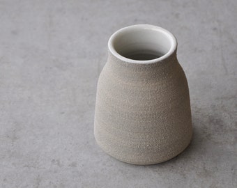 Small vase with sand structure, mini vase