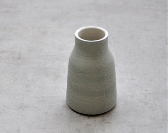 Small vase with sand structure, mini vase