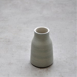 Small vase with sand structure, mini vase