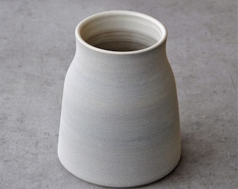 Vase with sand structure