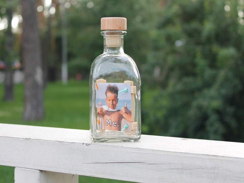 Photo in a photo frame in a bottle for a boy Photo in a photo frame in a bottle for a boy
