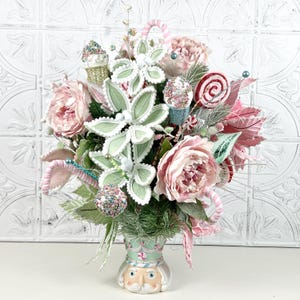 24&quot; Pastel Nutcracker Centerpiece with Frosted Florals and Sweet Treats – Pink Christmas Candy Decor