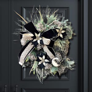 Elegant Christmas Wreath: Black & Gold Poinsettias, Jeweled Bow