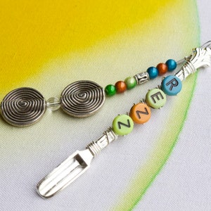 Silver Rezz mini spoon pendant jewelry, unique blue, green, and orange mini shovel jewelry