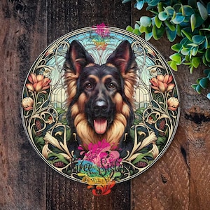 May include: A colourful illustration of a German Shepherd dog with a floral background. The dog is surrounded by flowers and vines in a stained glass style. The text "Three Sisters" is visible in the image.