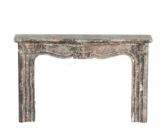 May include: A weathered gray and pink painted cast iron fireplace mantel with a decorative top and ornate detailing.
