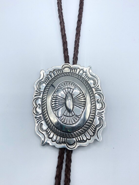 Bolo Tie: Native American Navajo handmade sterling