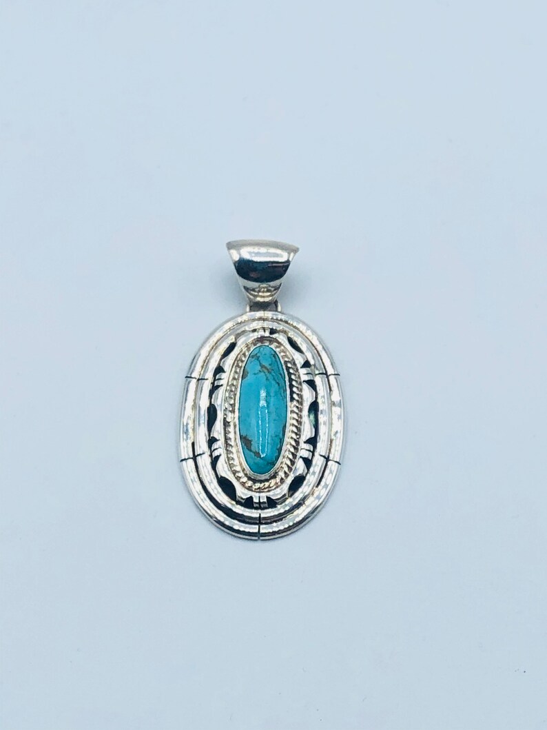 Native American Navajo handmade sterling silver turquoise pendant