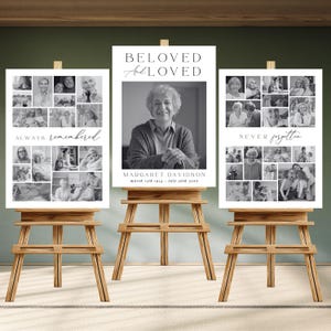 May include: Three wooden easels display memorial posters. The central poster reads "BELOVED and LOVED" above a grayscale portrait. The other posters feature photo collages with the phrases "ALWAYS remembered" and "NEVER forgotten."