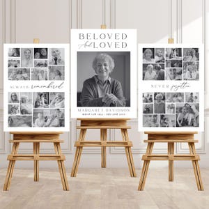 May include: Three memorial signs on wooden easels. The center sign features a black and white portrait and the text "BELOVED and LOVED." The other signs display photo collages with the phrases "ALWAYS remembered" and "NEVER forgotten."