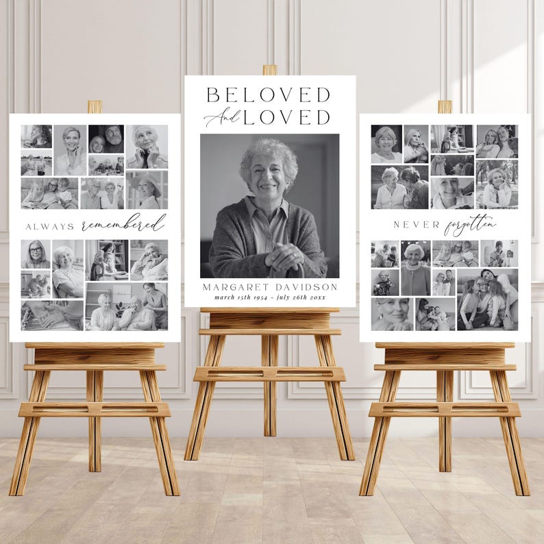 May include: Three memorial signs on wooden easels. The center sign features a black and white portrait and the text "BELOVED and LOVED." The other signs display photo collages with the phrases "ALWAYS remembered" and "NEVER forgotten."