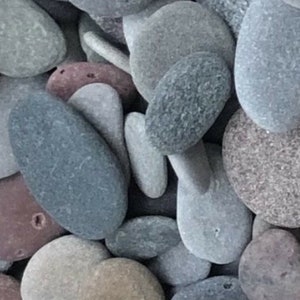 Craft pebbles. Selection of natural shaped/coloured pebbles for art work. Sold by weight.