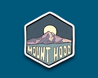 May include: A sticker with a stylized illustration of Mount Hood, a mountain with a peak, under a crescent moon and stars. The text "MOUNT HOOD" is written in yellow letters on a blue background.