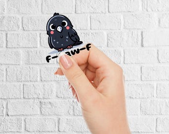 Cute Black Cartoon Bird Sticker with Text "F-Caw-F" - Adorable Decal for Laptops and More! Perfect Gift for Bird Lovers and Art Enthusiasts.