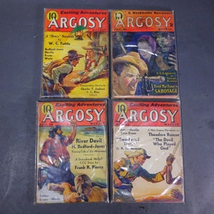May include: Four vintage copies of the Argosy magazine, each with a different cover featuring illustrations and text. The covers are dated April 18, April 11, December 30, and April 25. The text on the covers includes titles like "River Devil", "Two-Faced Torres", "Sabatage", and "The Devil Who Played God".