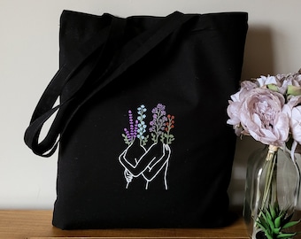 tote bag negra de algodon con abrazo de amor, bolsa de tela negra con flores