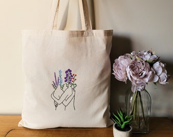 tote bag de algodon minimalista, bolsa de tela con silueta abrazo, bolsa de algodon con flores, tote bag para compras, bolsa decorada