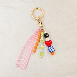 Porte-clés pour sac à dos de fille, accessoire esthétique avec nœud, dés et cœurs, cadeau pour adolescente