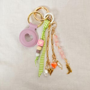 Porte-clés AirTag esthétique, breloque coquette avec support cœur, accessoire rose mignon et fonctionnel, cadeau pour elle