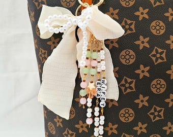 bow pearl bag charm, coquette bag charm, aesthetic purse charm, feminine bag accessory, pearl bow keychain, romantic bag charm