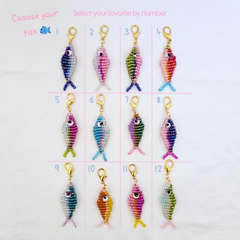 May include: A collection of beaded fish charms in various colors, each with a gold-colored clasp. The image includes text that says "Choose your fish" and "Select your favorite by number". Each fish is numbered 1 through 12.
