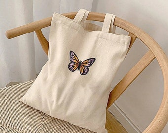 tote bag de mariposa estilo y2k, tote bag aesthetic de mariposa, bolsa de tela de mariposa minimalista, bolsa de tela para la compra