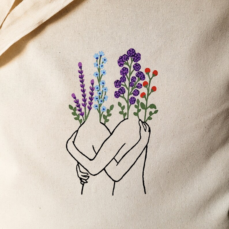 May include: Two stylized figures embracing, with purple, blue, and green flowers growing from their heads. The flowers are outlined in black.
