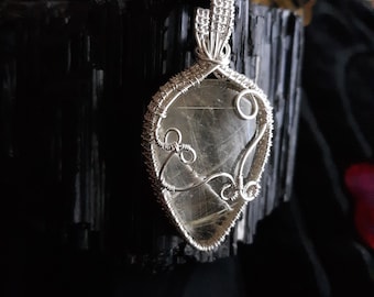 Gilded Glow: Handmade Silver-Wrapped Golden Rutile Quartz Pendant