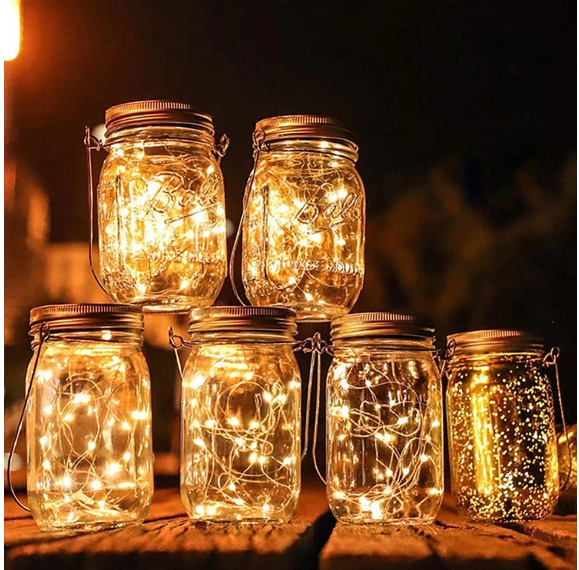 Few firefly lanterns lit in a dark night