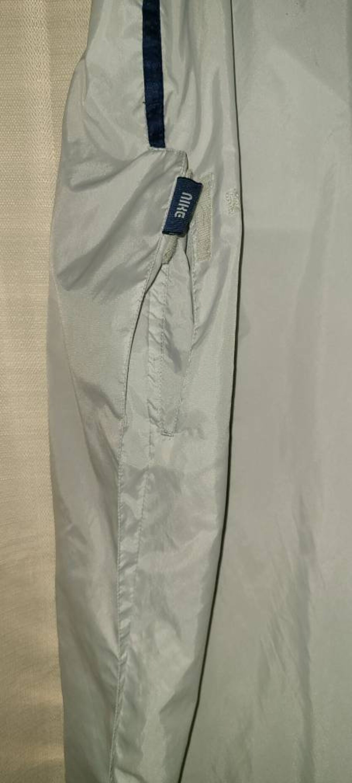 white nike windbreaker pants