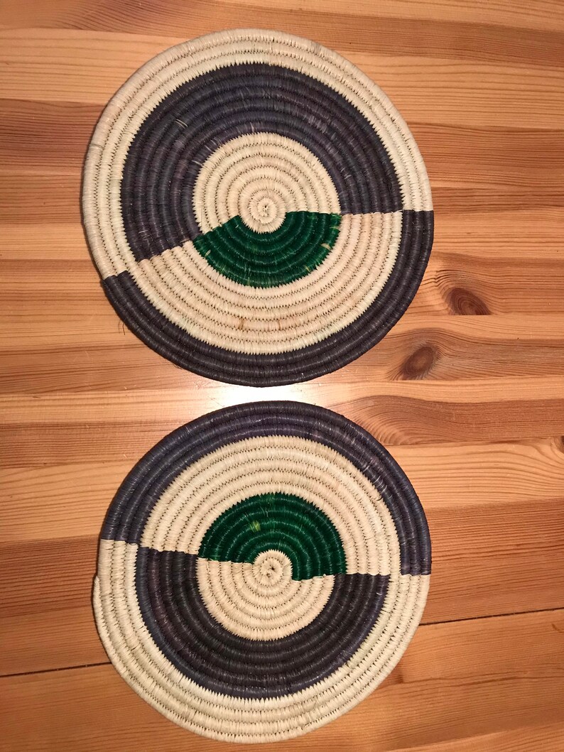 Sets of two grasswoven table mats by a women's group from Etsy