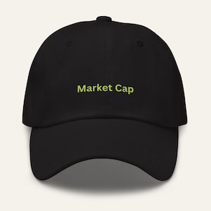 May include: A black baseball cap with the text "Market Cap" embroidered in green on the front.
