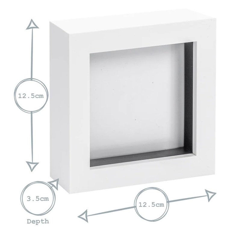 May include: White square shadow box frame with a 12.5 inch by 12.5 inch opening and a depth of 3.5 inches.