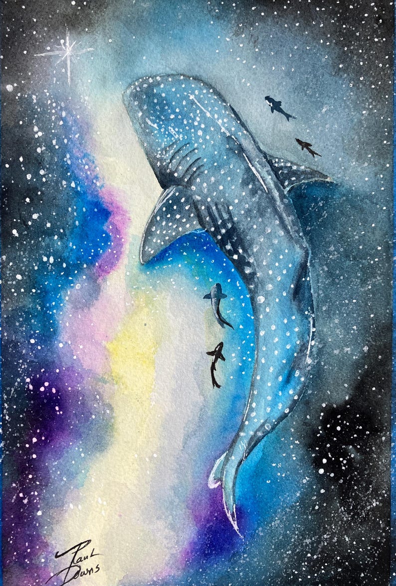 May include: Watercolor painting of a whale shark swimming in a starry galaxy. The whale shark is blue with white spots, and several smaller fish swim nearby. The background features shades of blue, purple, and yellow.