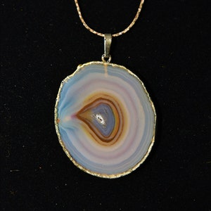 Agate Slice Necklace With Decorative Gold Trim.  Comes With Chain.